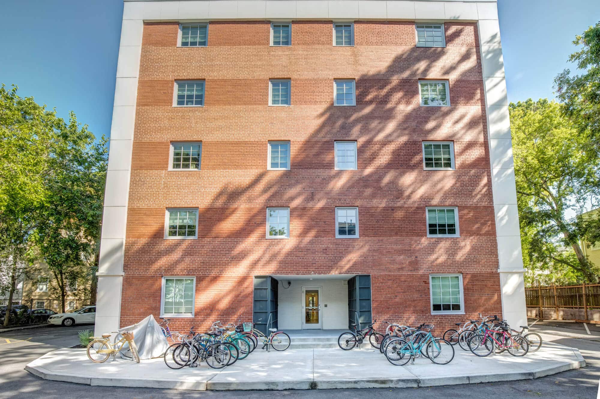 61 vandy off campus apartments near the college of charleston c of c building exterior back entrance bike storage
